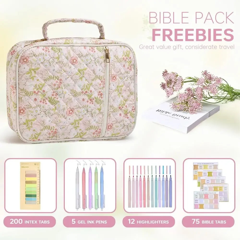 Pink quilted floral bible cover with a zipper and pen holder alongside various stationery items