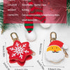 A red and green knitted Christmas ornament keychain featuring a snowflake design on a white background.