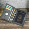 A dark gray leather passport card holder displaying various ID cards and a passport document.