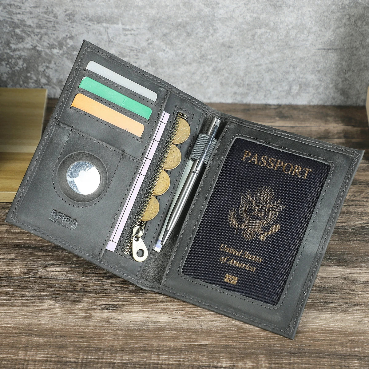 A dark gray leather passport card holder displaying various ID cards and a passport document.