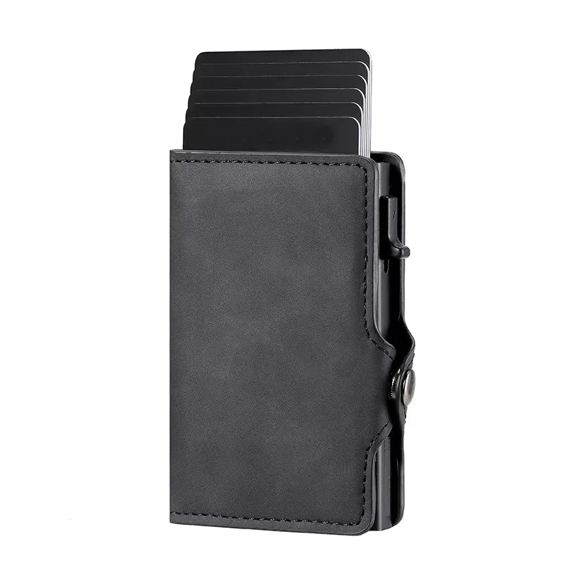 A black slim RFID-blocking carbon fiber card holder with a leather sleeve.