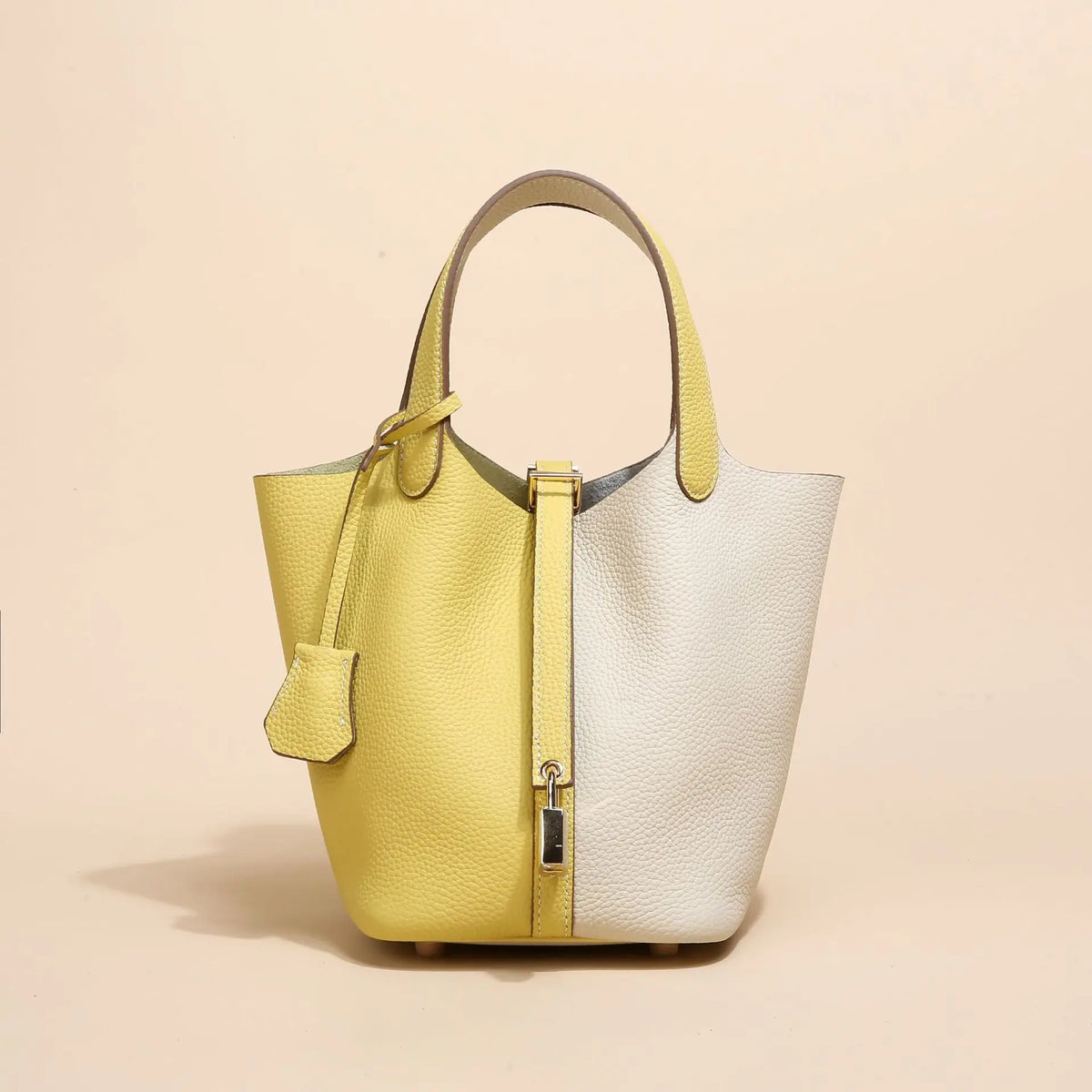 Hellgelbe und weiße Leder-Bucketbag mit Schnurverschluss