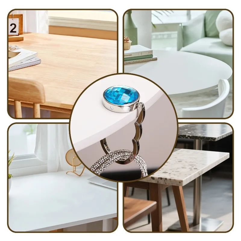 A round acrylic foldable hook with a blue gemstone is shown on a white table.