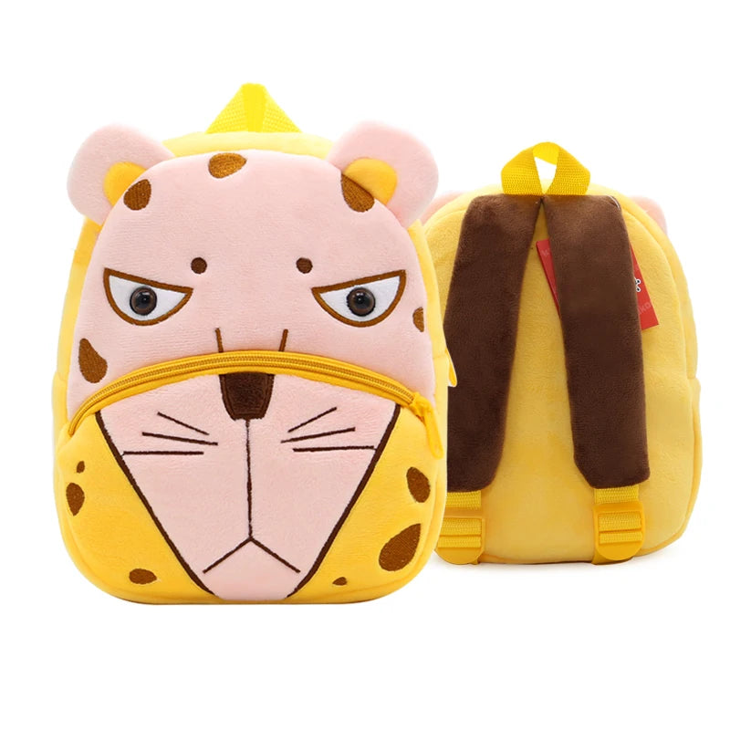 A yellow and pink cartoon animal plush backpack shaped like a tiger face.