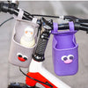 A purple silicone cup holder is mounted on a bicycle handlebar, designed for holding cups or bottles.