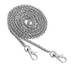 A coiled stainless steel diamond-cut curb chain bag strap.