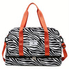 An orange nylon travel duffle bag with a black and white zebra stripe pattern.