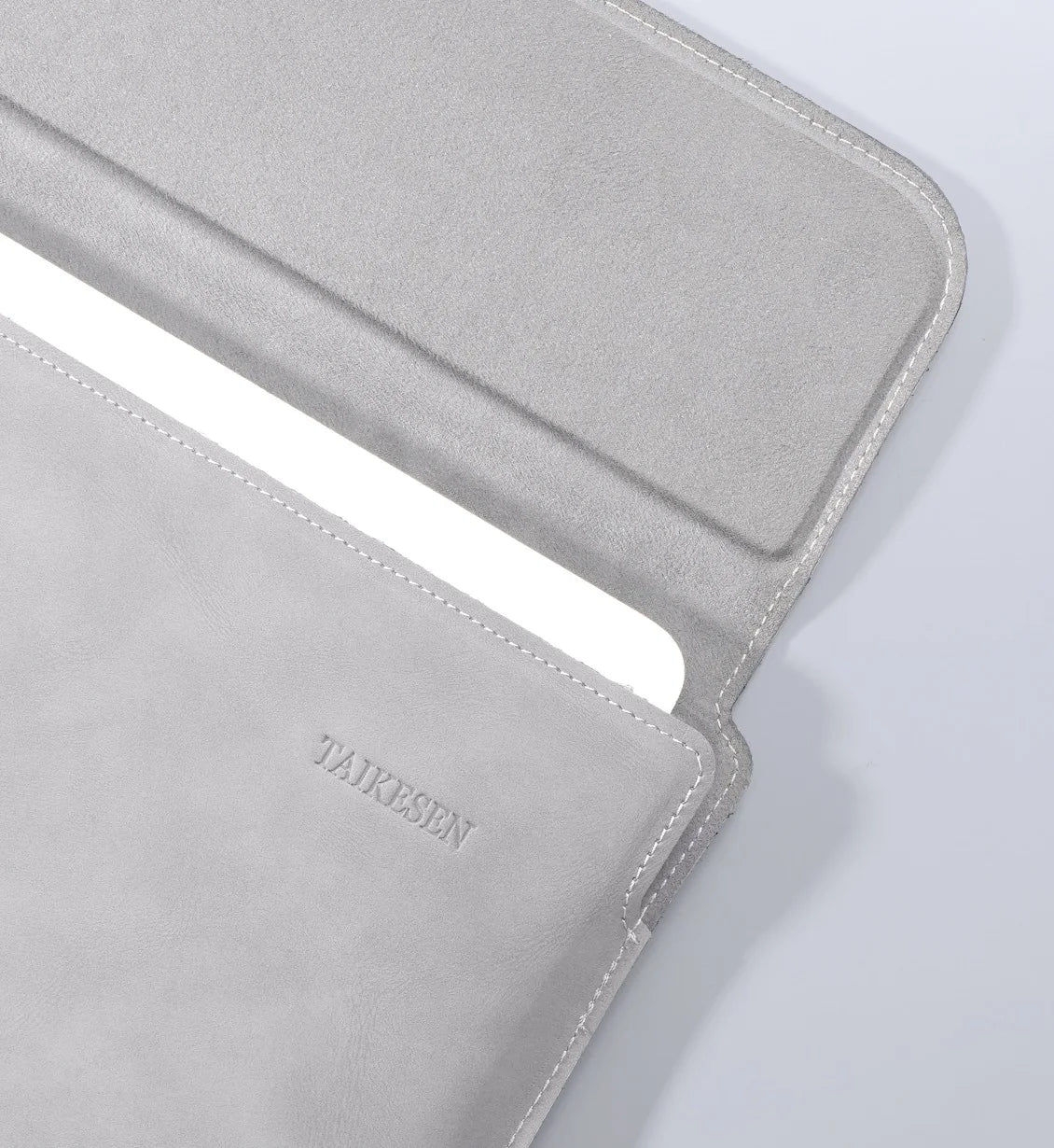 A light gray premium PU laptop sleeve for a notebook, shown from the side.