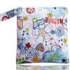 A colorful fabric reusable waterproof snack bag with a floral and nature print.