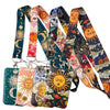 A collection of colorful triple moon patterned lanyards and key rings featuring celestial designs.