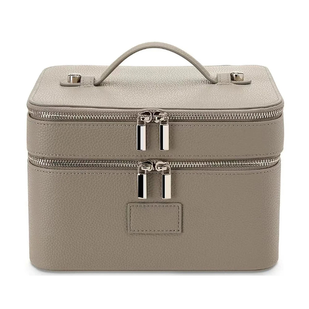 A beige double-layer makeup storage case with a handle and silver zippers.