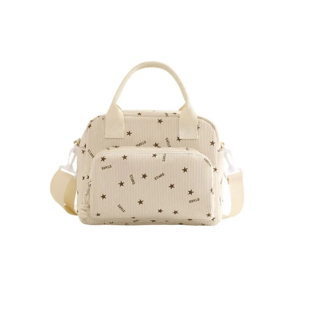 Sac de pique-nique portable en velours côtelé beige avec motif étoile et sangles beige clair.