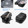 A black laptop backpack demonstrating a one-way exhaust valve and vacuum compression features.