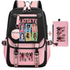 Pink and black canvas backpack featuring various girl prints and a sporty design.