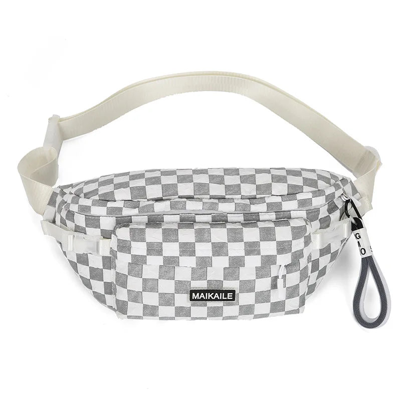 A plaid gray and white checkered crossbody chest bag with a light beige adjustable strap.