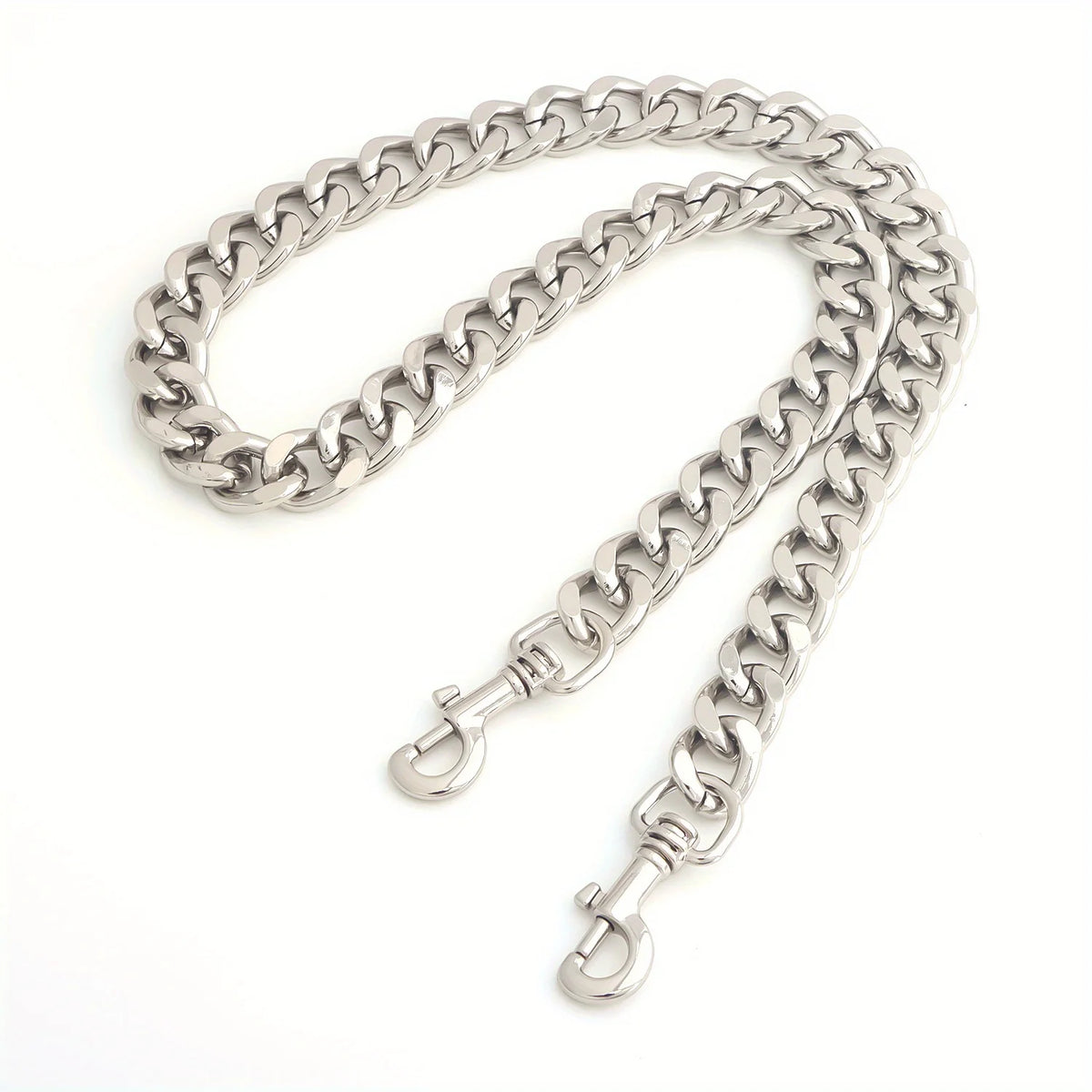 A thick silver metal purse chain replacement strap laid out on a white background.