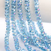 Strands of light blue AB faceted crystal glass beads in a wheel shape for jewelry making