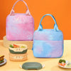 Three insulated backpacks in pink and blue colors are displayed on a light surface.