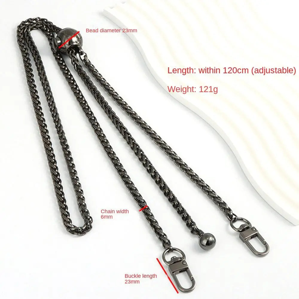 Correa de bolso de metal negro con cuenta de 23mm y ajuste de hasta 120 cm.