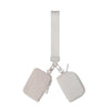 A light beige nylon zipper wristlet pouch with a strap and attached to a keyring.