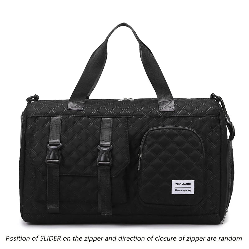 Black nylon travel duffle bag with a quilted pattern and two carrying handles