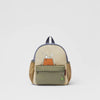A beige canvas shoulder bag featuring a Snoopy cartoon design and a gray strap.