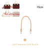 A light beige leather replacement shoulder strap with a gold buckle for handbags.