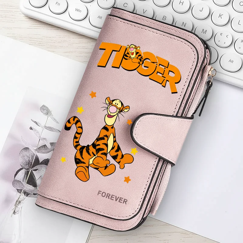 A pink women's long zipper handbag featuring a tiger graphic and the word forever