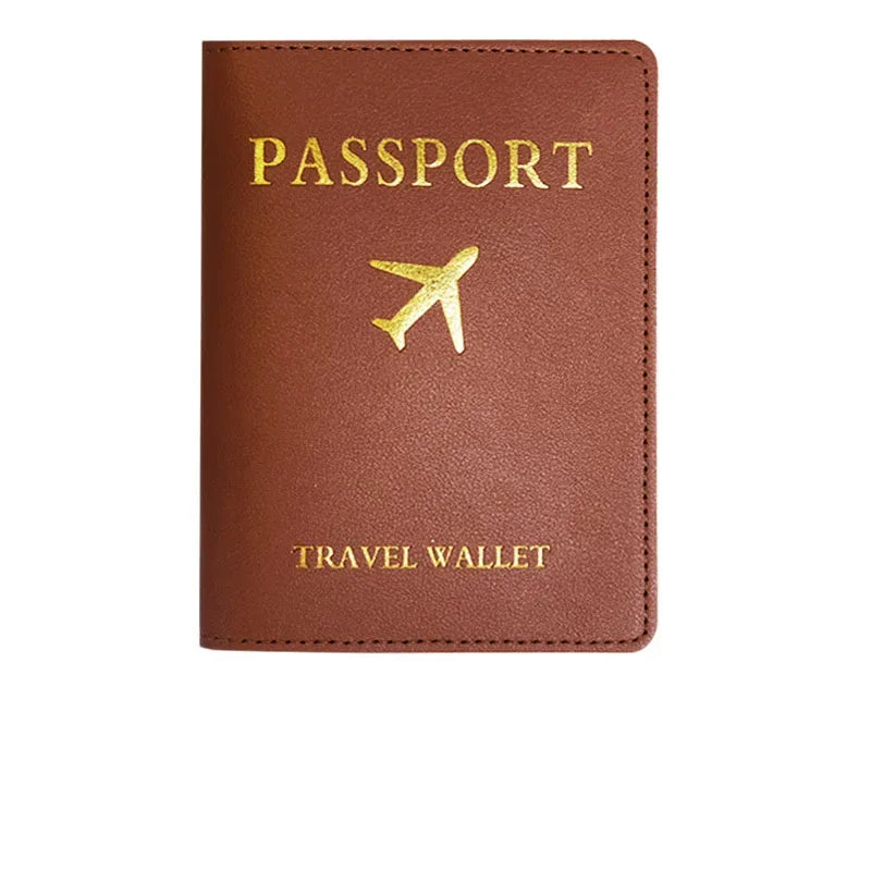 A brown PU leather passport wallet featuring gold embossed text and a golden airplane icon.