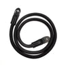 Black adjustable camera and DSLR shoulder strap coiled on a white background