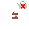 A beige leather crossbody bag with a red cross detail and a matching leather strap.