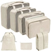 A set of beige fabric storage organizers and a matching drawstring pouch.