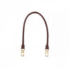 A brown cowhide leather shoulder strap with gold-toned hardware.