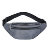 A gray nylon crossbody sling bag with a black adjustable strap and a zippered pocket.