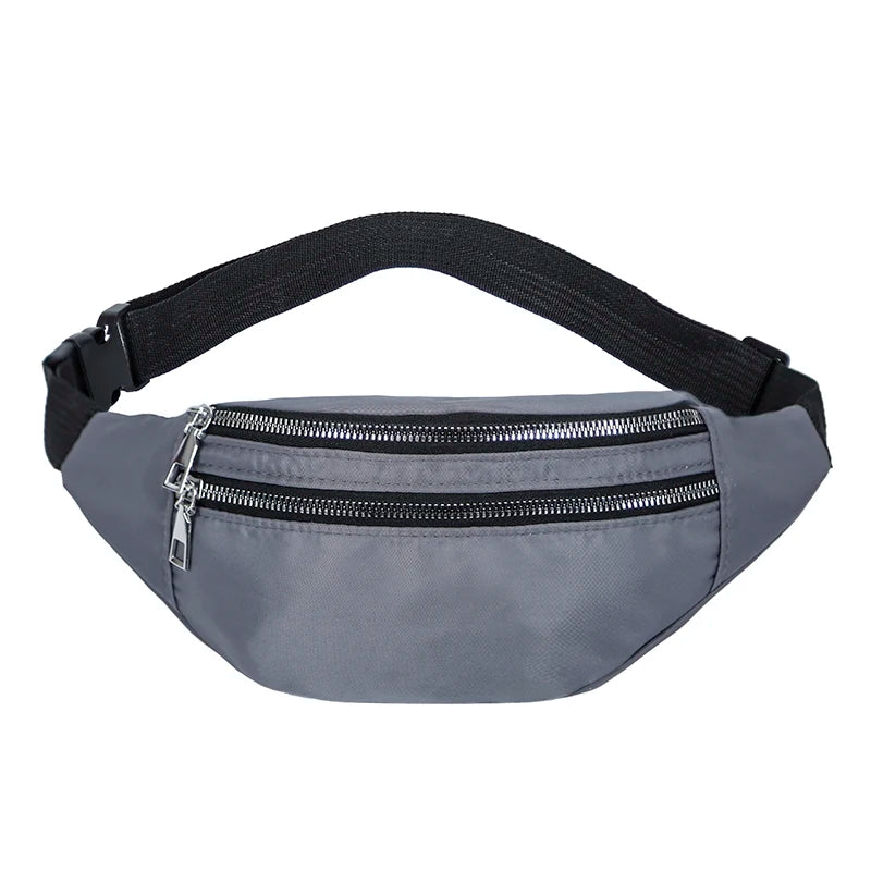 A gray nylon crossbody sling bag with a black adjustable strap and a zippered pocket.