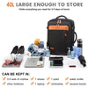 A black travel backpack is shown open, revealing various items like clothes, shoes, electronics, and toiletries organized in 