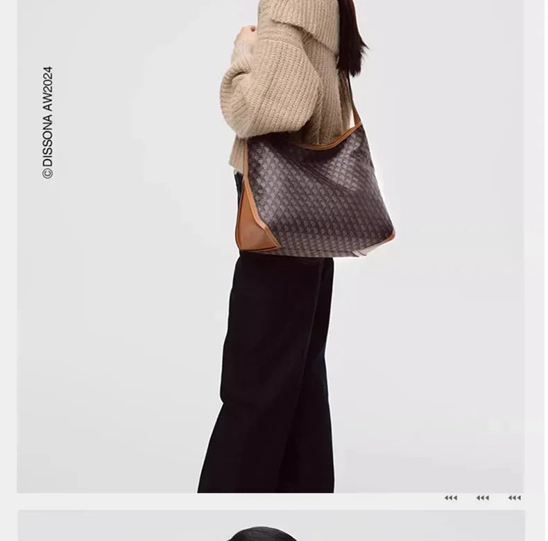 A woman is shown holding a gray geometric embroidery hobo shoulder bag with brown leather trim.