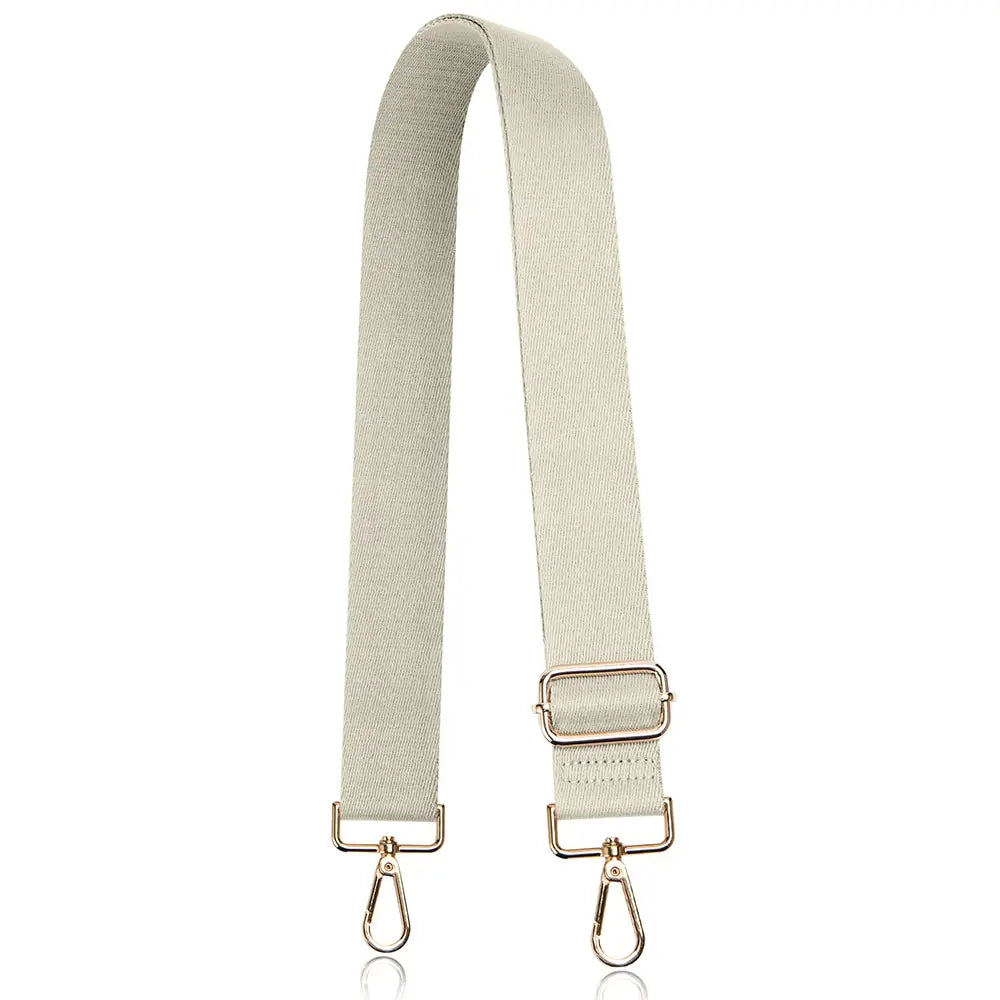 A beige nylon crossbody bag strap with gold-toned hardware.