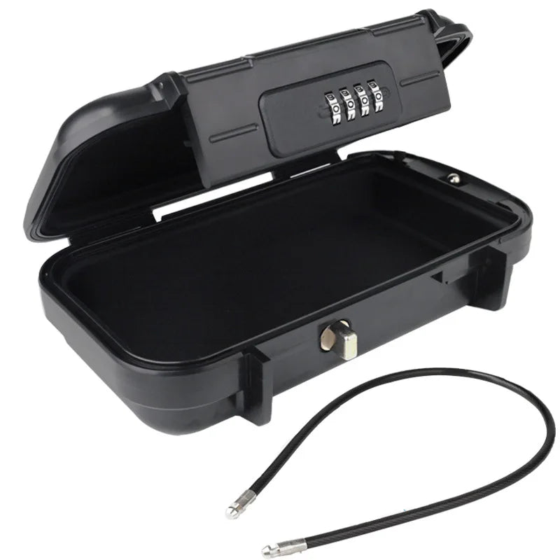 A black portable travel lock box with a lid open, showing the interior and an attached cable.
