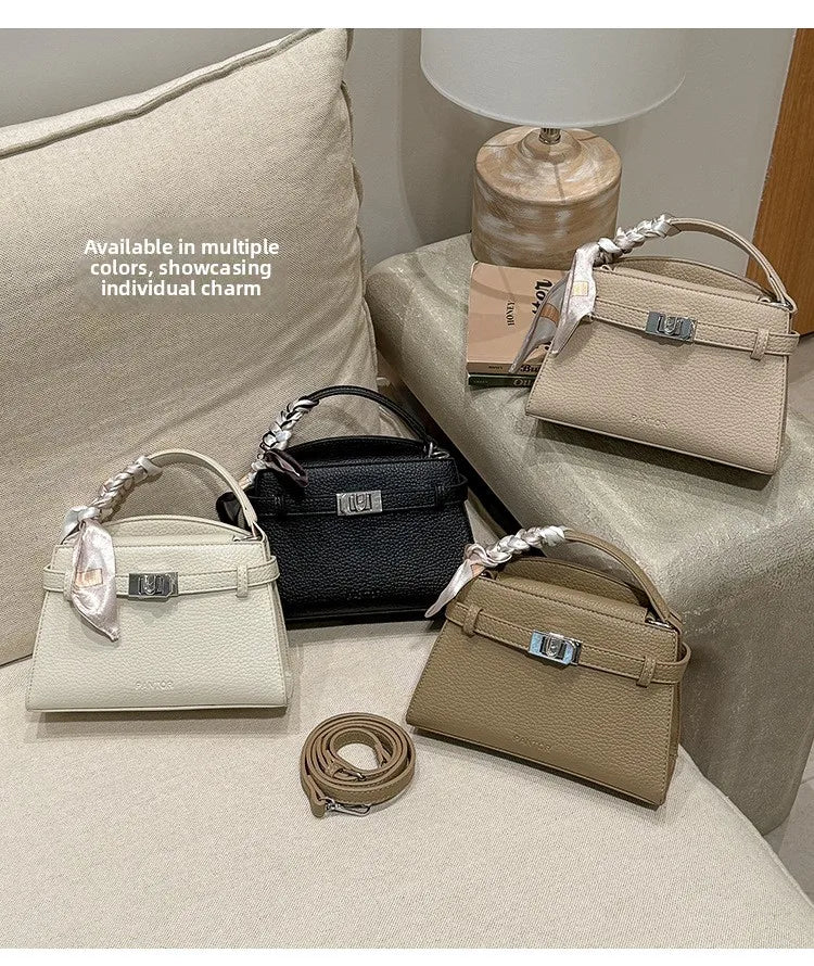 A collection of elegant PU leather crossbody clutch bags in various neutral tones displayed on a light fabric surface.