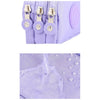 A close-up view of a purple compact three-layer nylon zipper pouch with gold-toned hardware and white embroidered details.