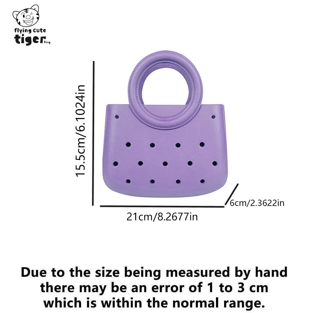 Purple round PVC handbag featuring a DIY hole design.