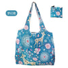 A reusable eco tote shopping bag featuring a blue background with white and pink floral patterns and a silhouette of a deer.