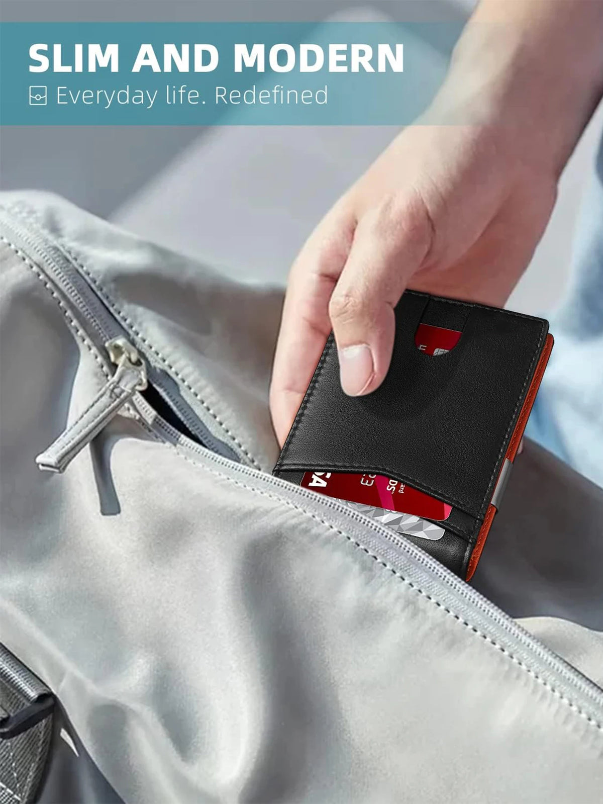 A hand is inserting a black minimalist slim wallet into a gray jacket pocket.