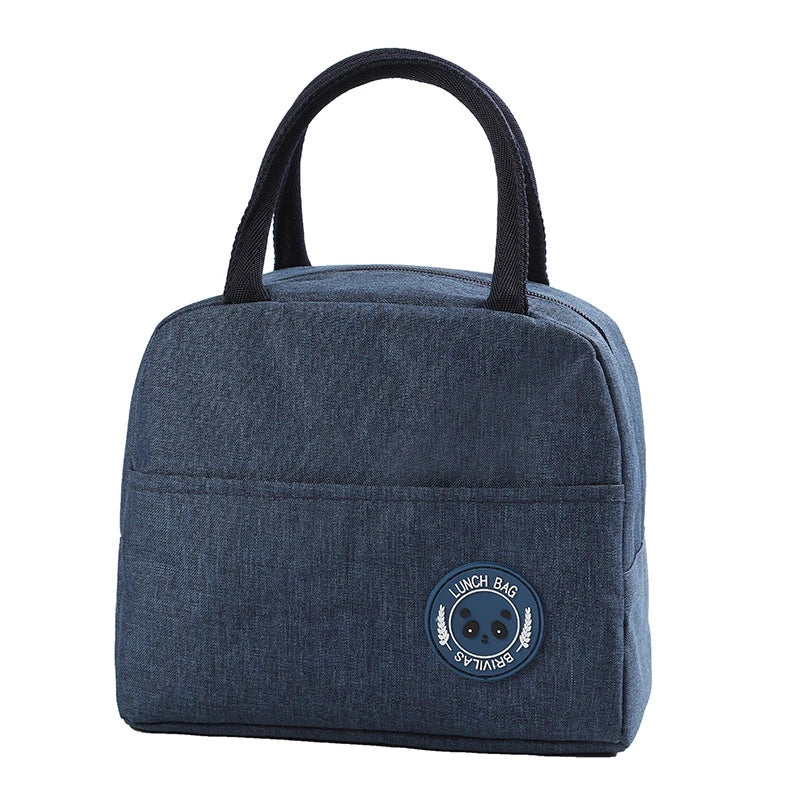 A dark blue insulated lunch bag with black handles and a circular logo featuring a bear.