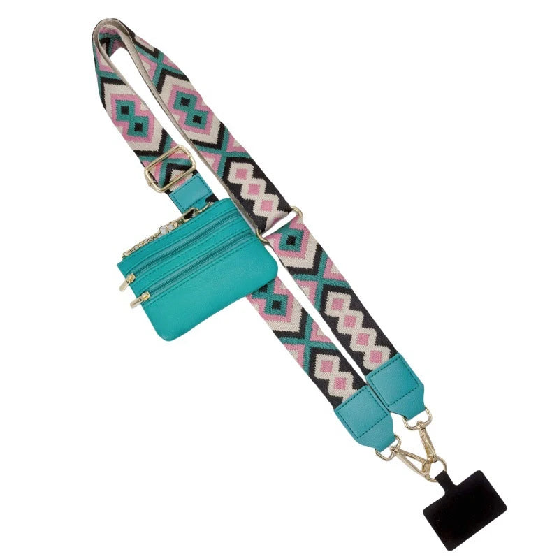 A teal phone lanyard featuring a patterned strap and a detachable leather wallet.