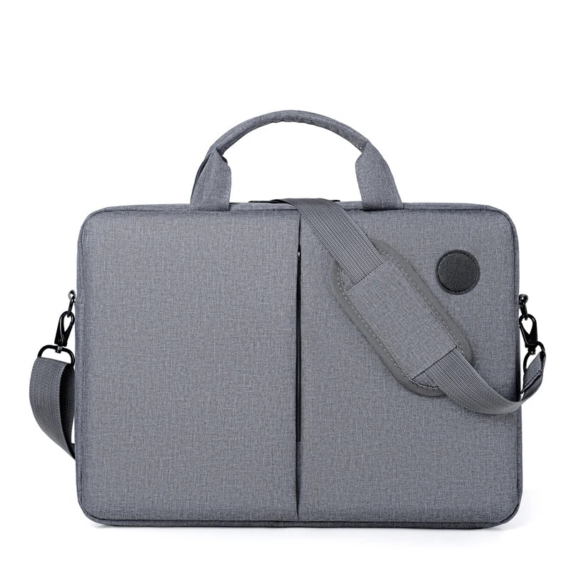 A gray slim commuter laptop briefcase with a padded design and carrying straps.