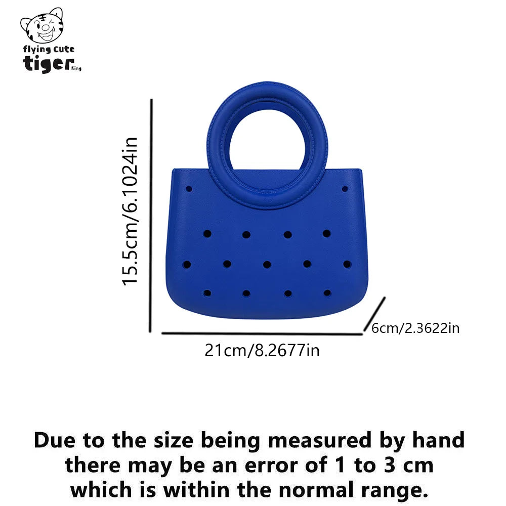 Blue round PVC handbag with a DIY hole design and a loop handle