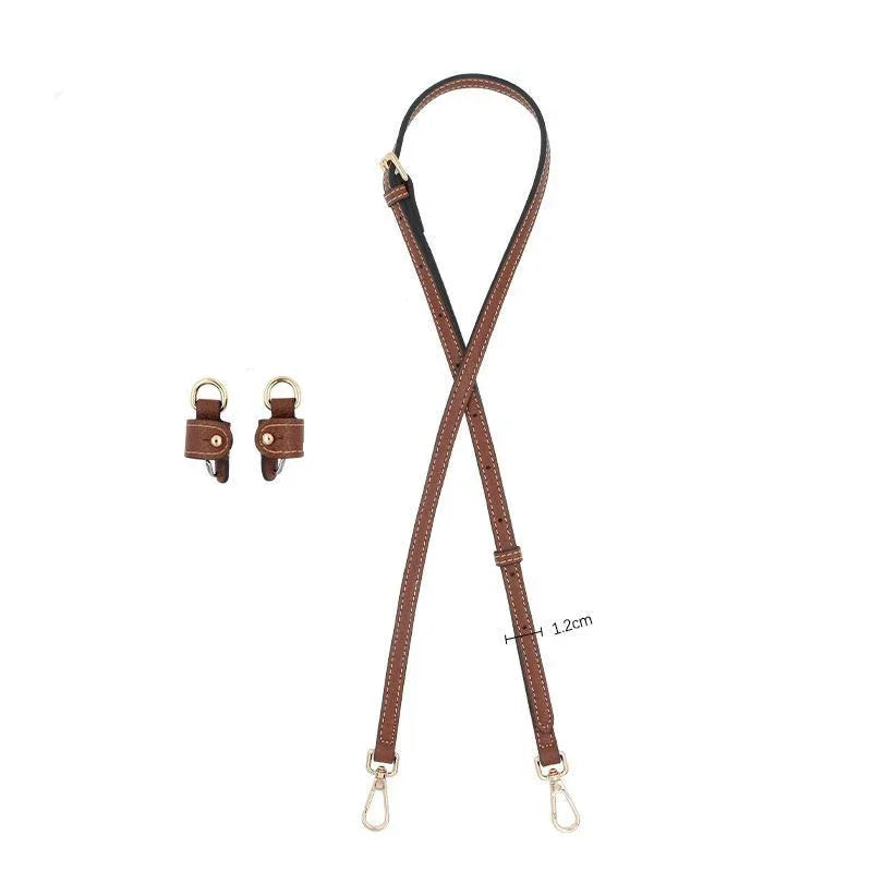 Kit de correa de cuero marrón con hebillas ajustables y una correa larga.