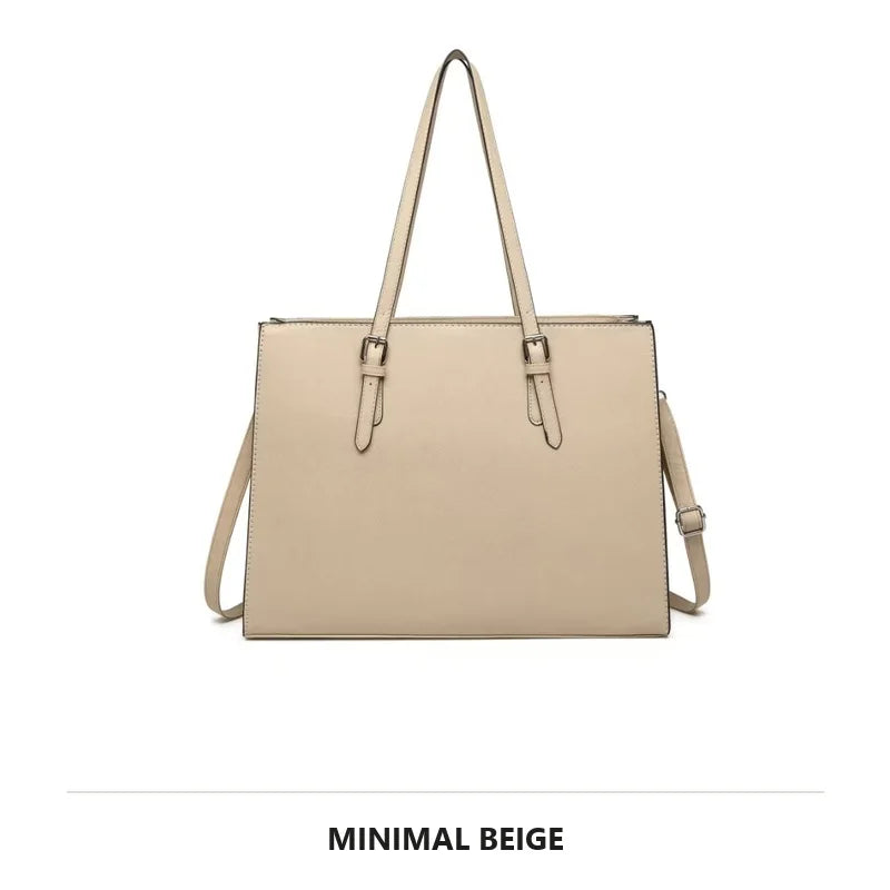 A beige leather laptop tote bag with a crocodile texture shown from the front.